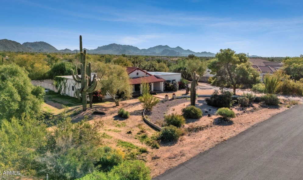 Aerial view of the North Scottsdale property with mountain backdrop